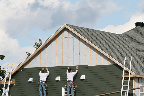 Professional Storm Damage Siding Repair technician working in Salem, IL
